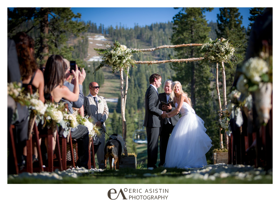 Bride laughs at the groom during their wedding at The Ritz Carlton Lake Tahoe.