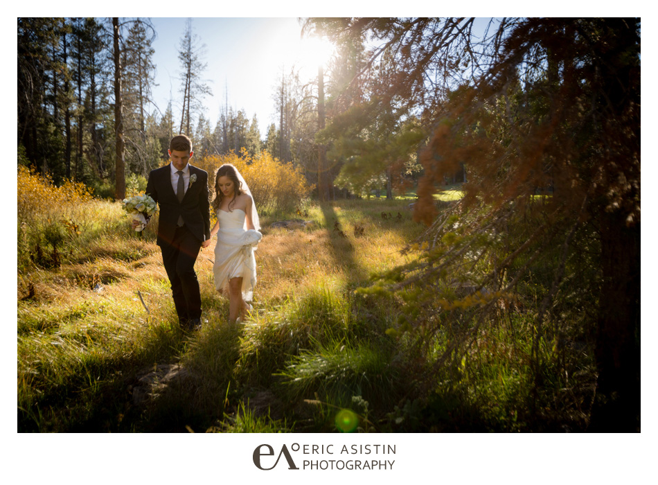Bride and Groom take a walk in the forest at The Lodge at Tahoe Donner